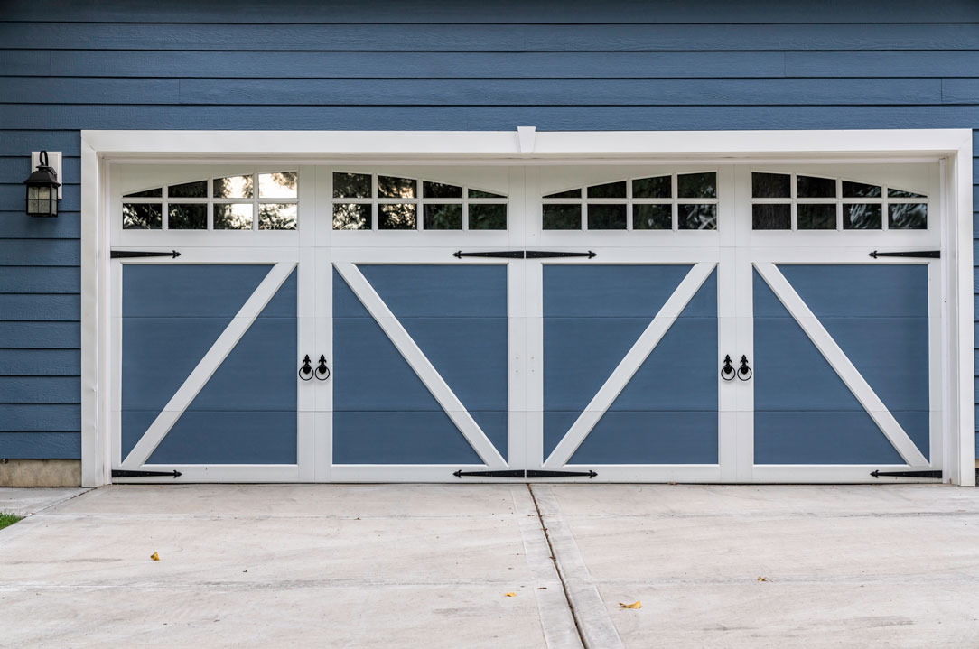 Carriage house garage door with window inserts Modern carriage house garage door