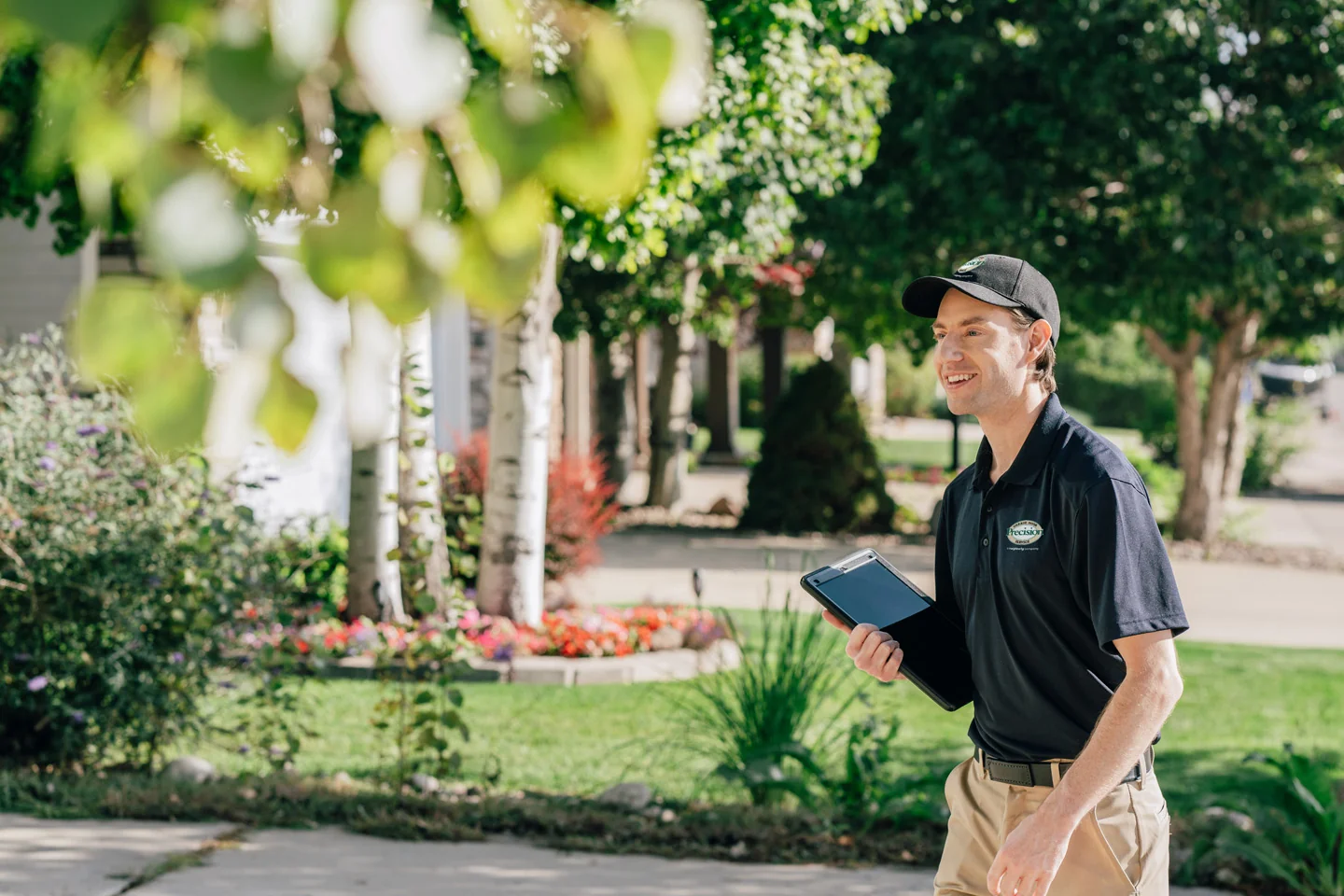 Garage door technician outside of home Garage door technician outside of home